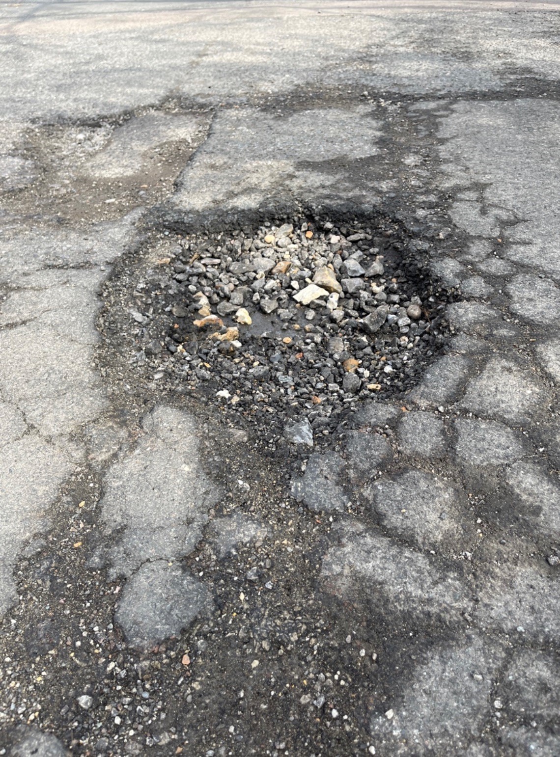 pothole on Abbotts Lane