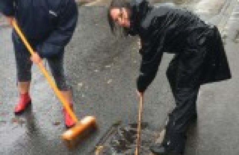 Residents Previously clearing the drains in Downsway