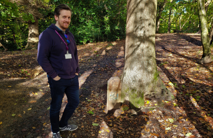 Scott Roche by boundary marker in Littleheath Woods