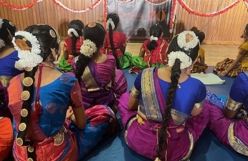 Young dancers eagerly awaiting their showcase performance