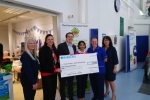 Councillors giving cheque to Croydon Conservative Hospital