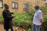 Kofi meeting with Raymond, resident of Kuala Gardens for 11 years