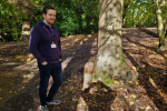 Scott Roche by boundary marker in Littleheath Woods