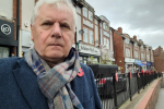 Robert in front of the poppies in Addington Road