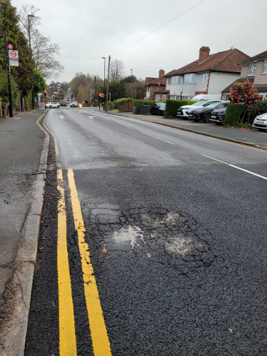 View of Farley Road showing faulty repairs