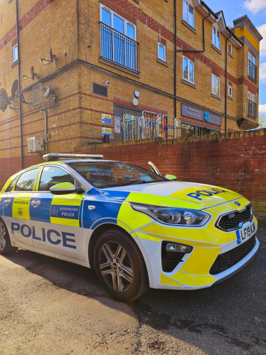 Police car outside of Kenley Co Op