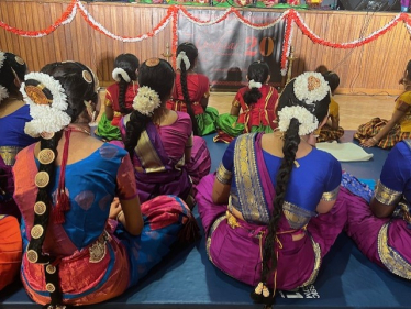 Young dancers eagerly awaiting their showcase performance